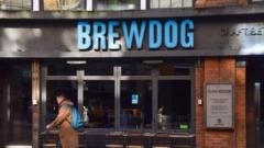 Bars close and hundreds lose jobs as US firm buys Brewdog in £33m deal