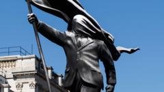 Banksy confirms he’s behind statue in central London