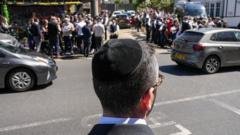 ‘I bought a baseball cap to hide my kippah’: Jews observe first Shabbat after Golders Green attack