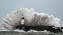 Storm Austen brings power cuts and travel disruption as more wind and rain forecast